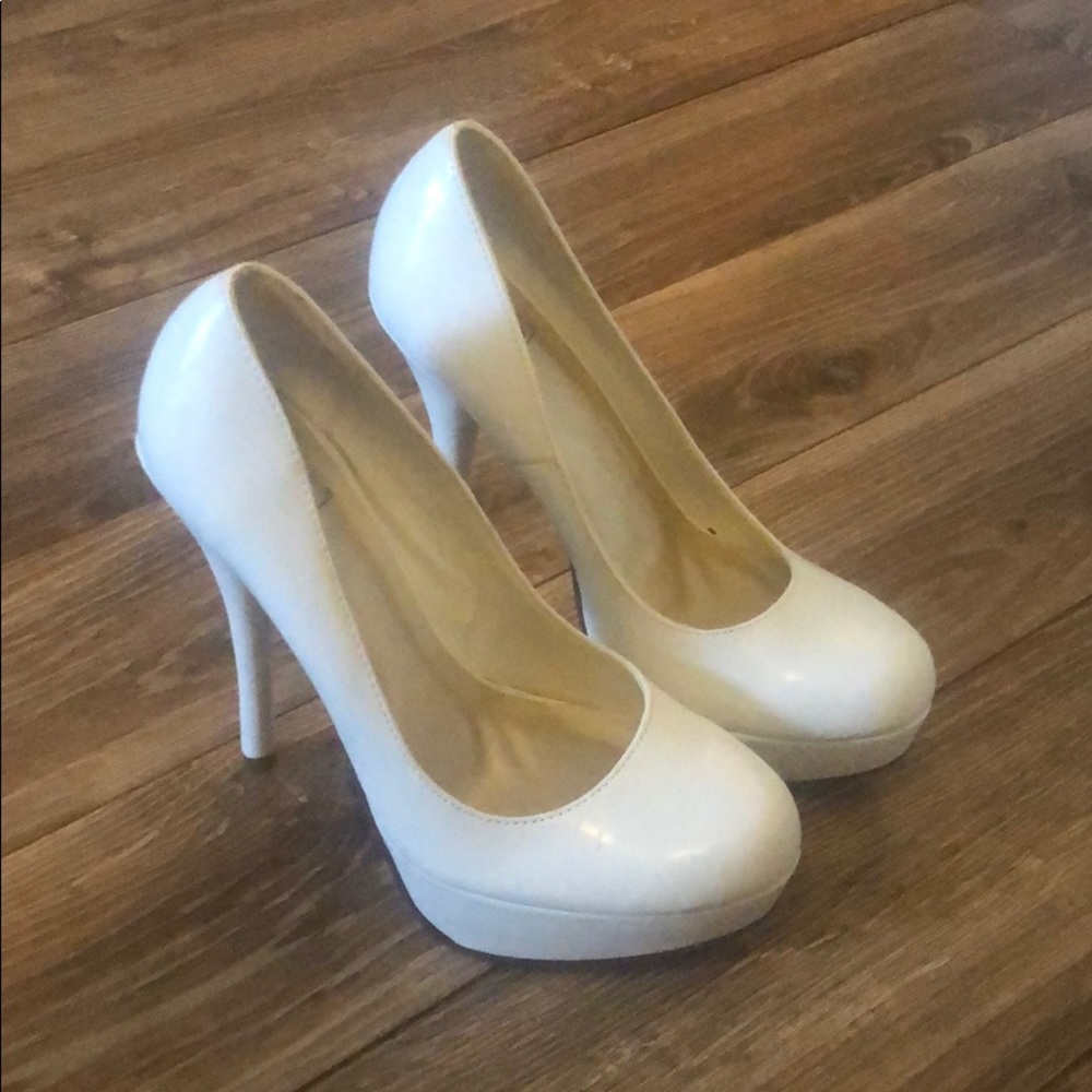 Brand new. White platform pumps size 7.5